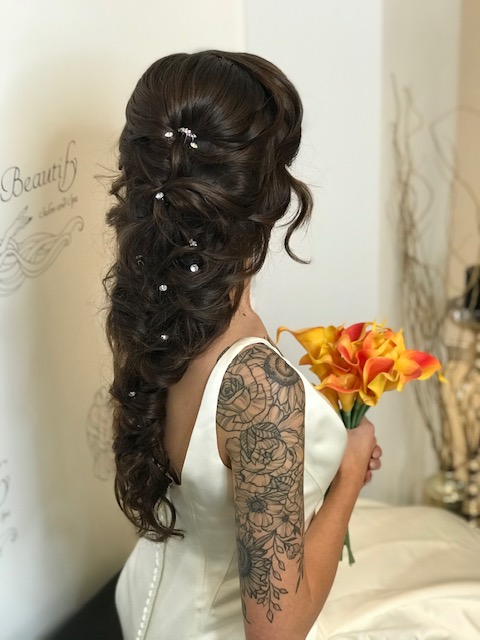 A photo of a young bride with her hair done by Beautify Salon and Spa