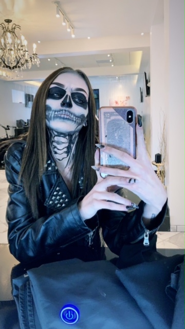 This is a photo of a lady wearing Skeleton Make up for Halloween, which was done by a make up artist at Beautify Salon and Spa in Henderson in Las Vegas
